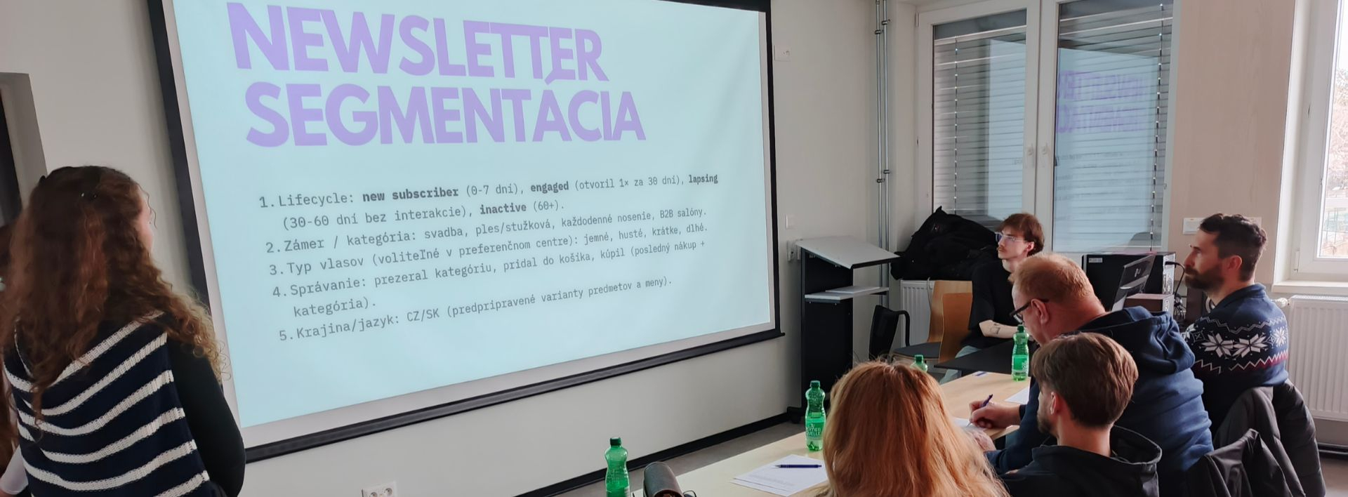 Hodnotenie zadania na vysokej škole FMK UCM.  Tomáš Lukáč, Katarína Švejnová a Viliam Kanianský
